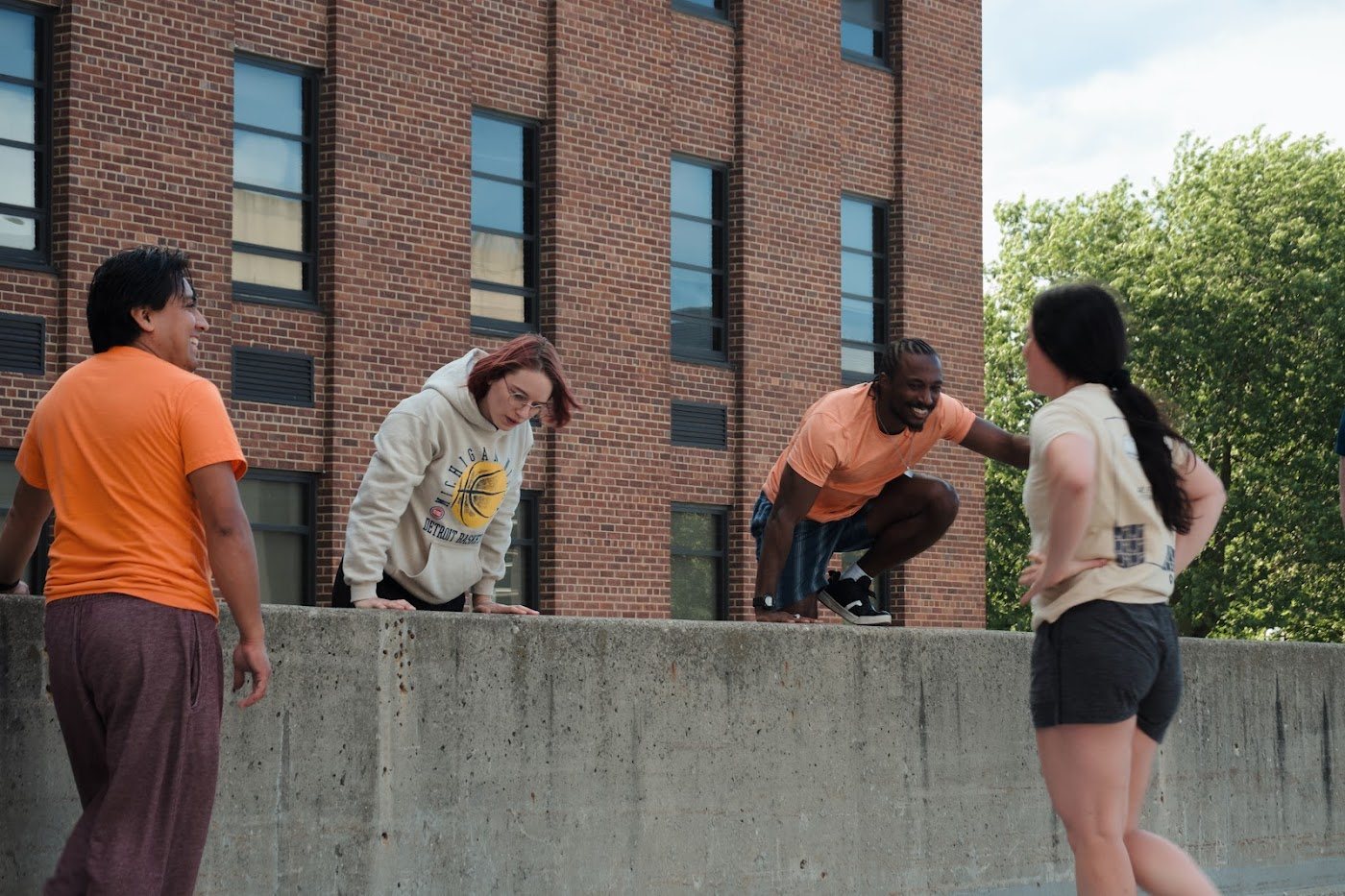 Michigan Parkour members practicing a wall movement challenge